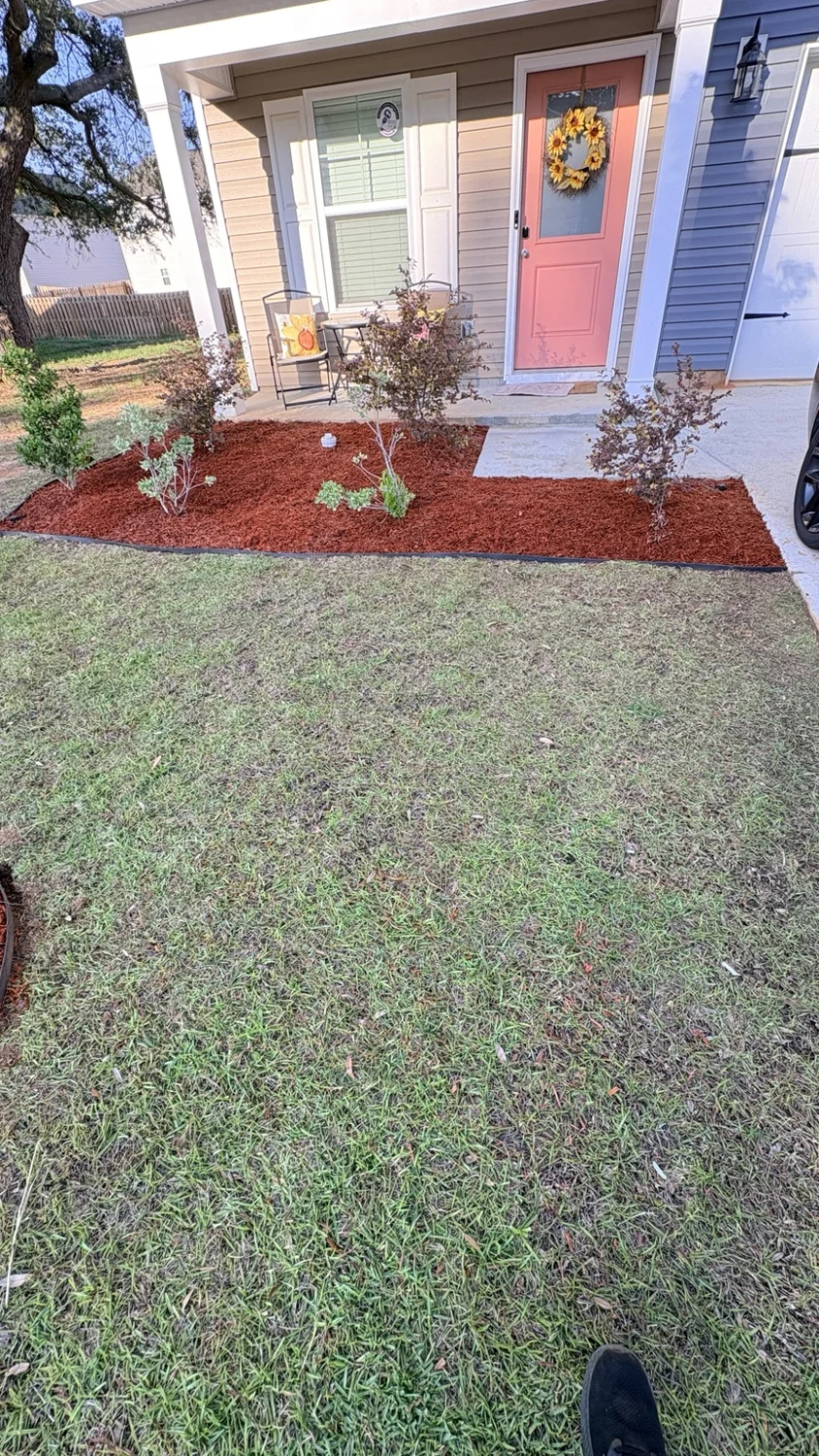 After mulch installation: mulch along the porch by Fixed by Hicks