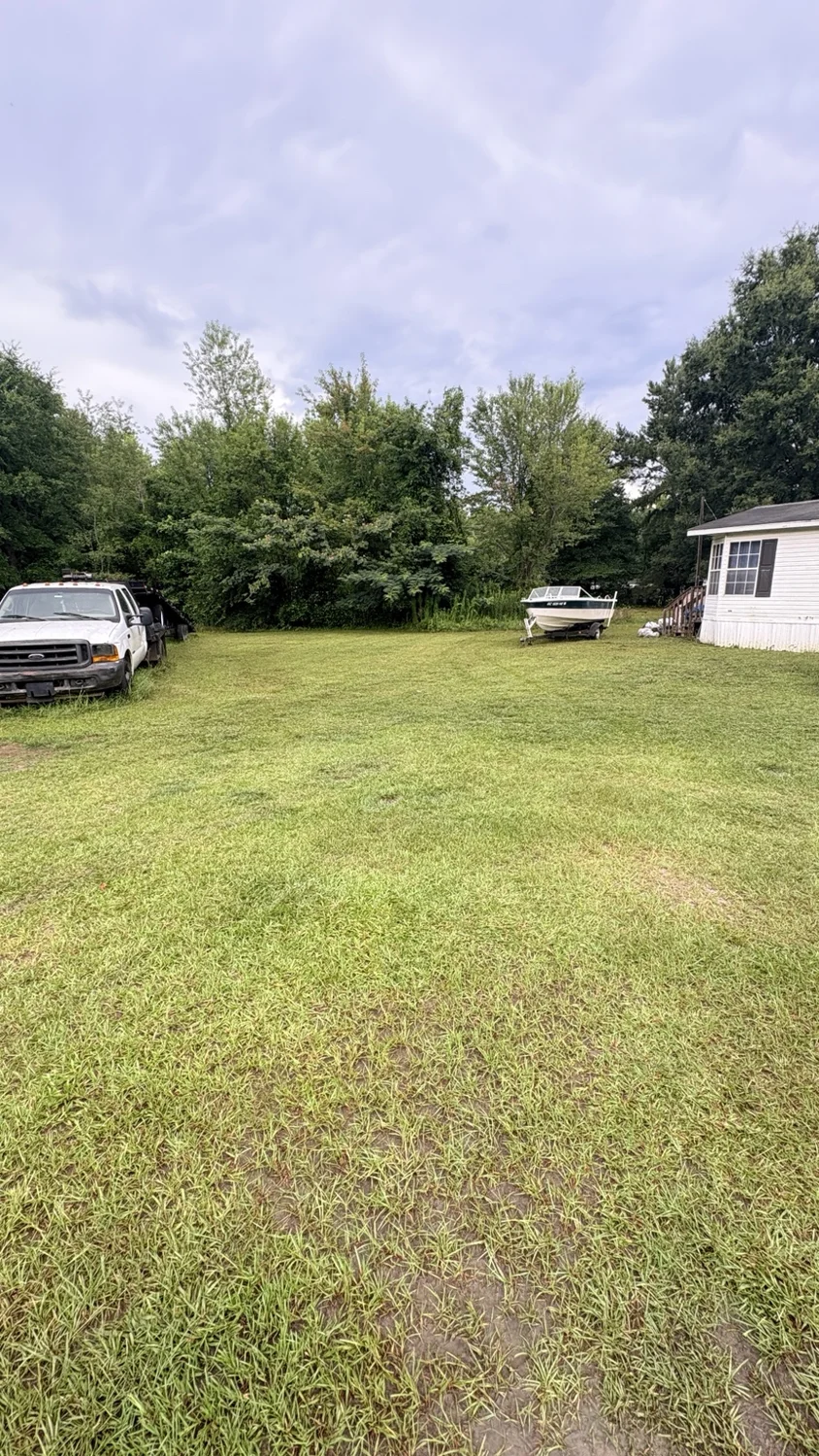 After lawn mowing: lawn care across the property by Fixed by Hicks